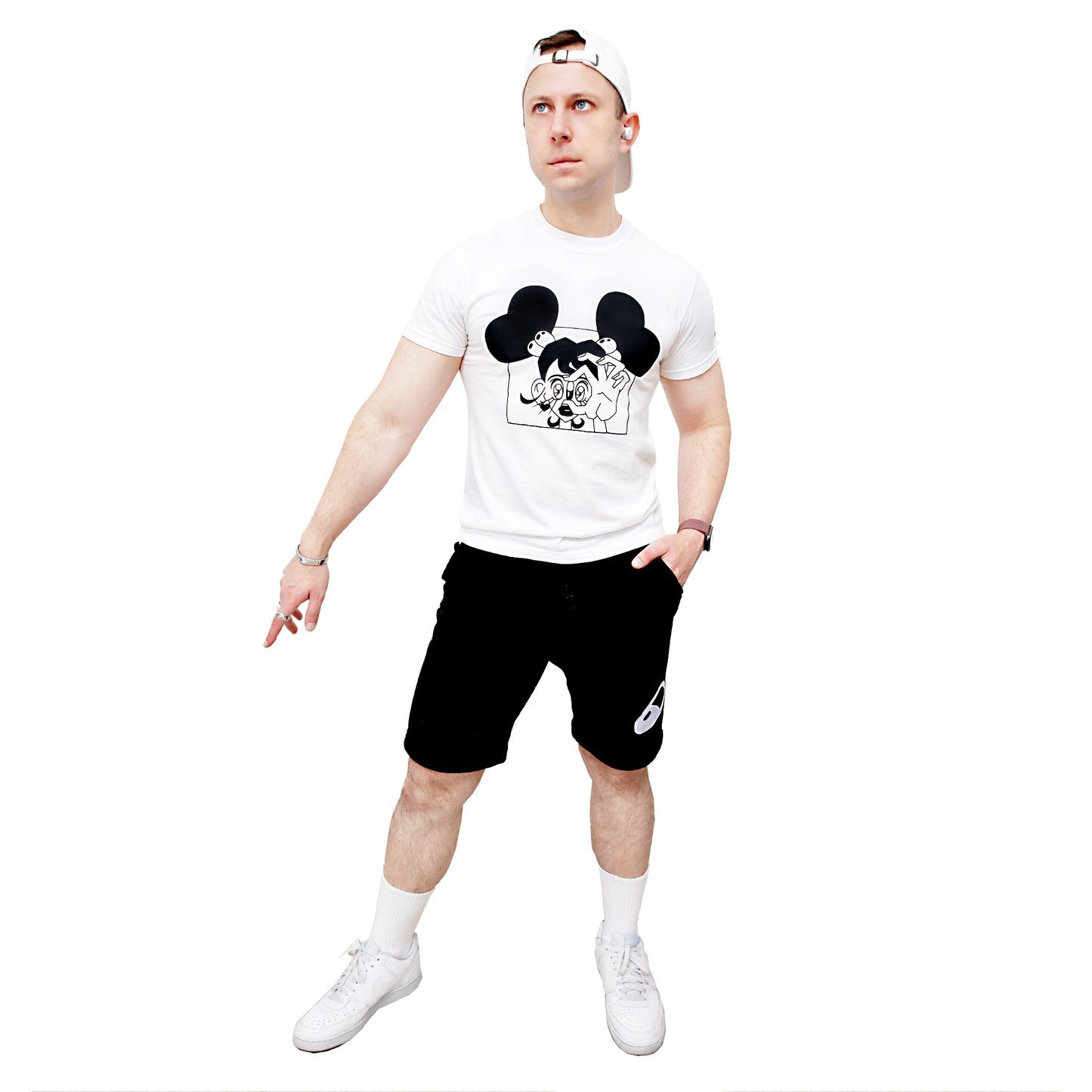 Male model wearing a white t-shirt with a Valentine Pill graphic design and black shorts on a white background.
